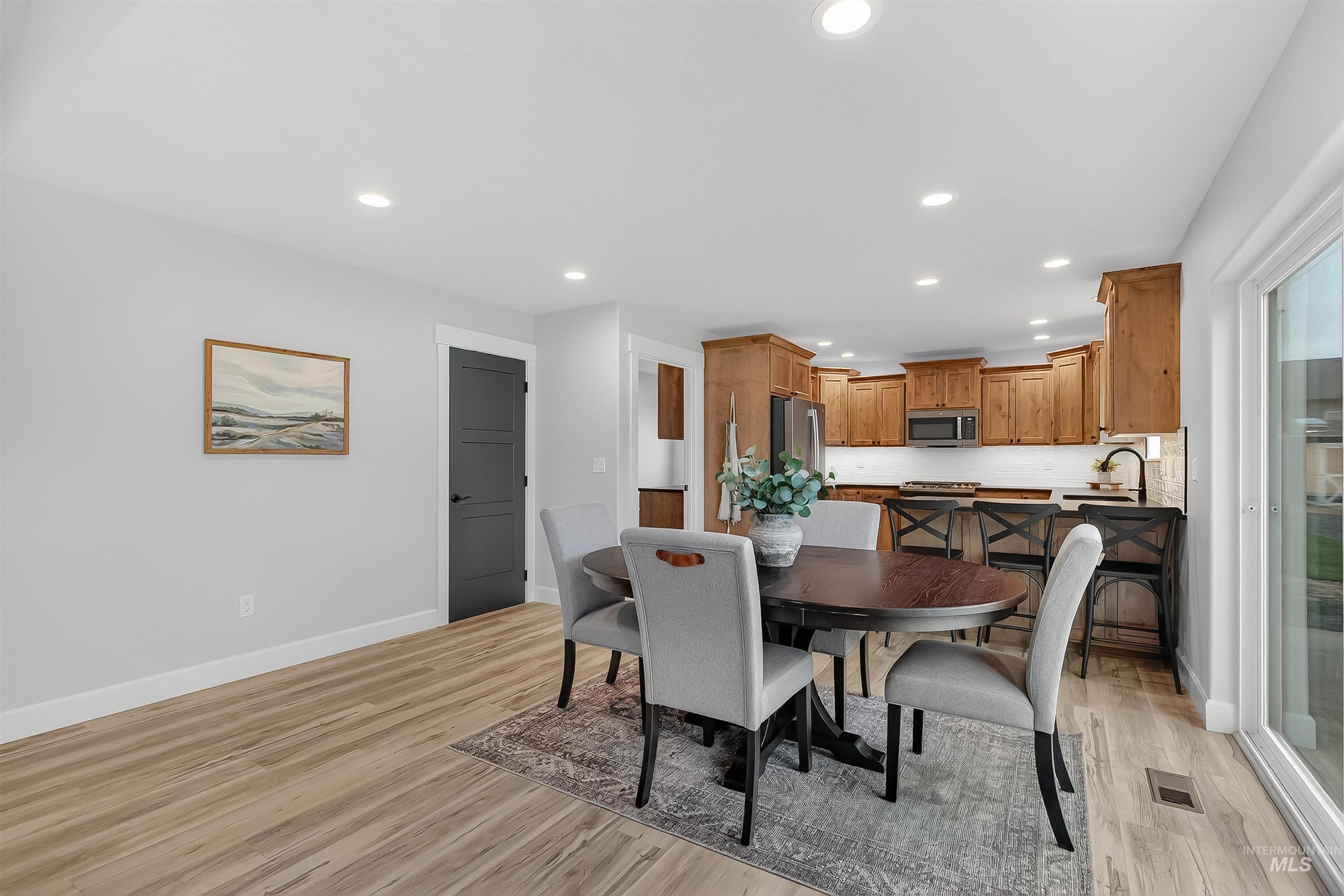 1725 Pathway Court Lewiston, ID 83501 - Photo 10 of 37 Dining room featuring recessed lighting and light wood-style floors