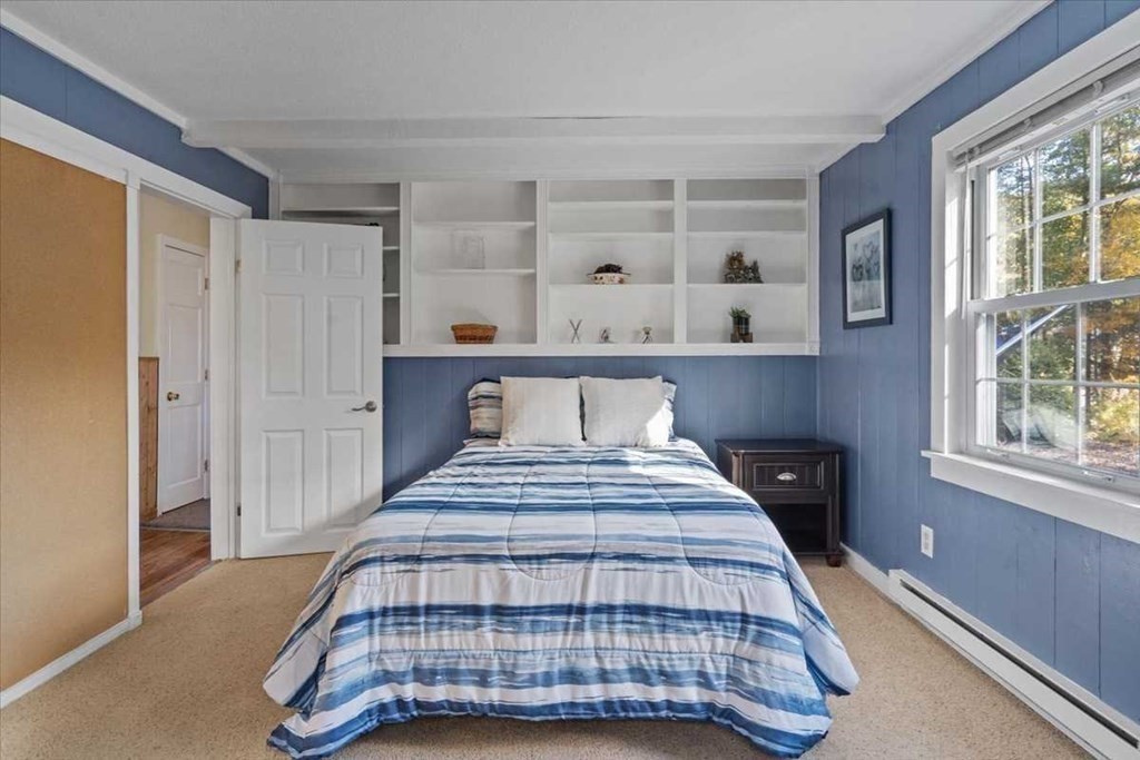 170 Shepard Road Sturbridge, MA 01566 - Photo 13 of 41 a bedroom with a bed and window