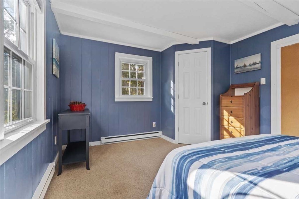 170 Shepard Road Sturbridge, MA 01566 - Photo 14 of 41 a bedroom with a bed and a window