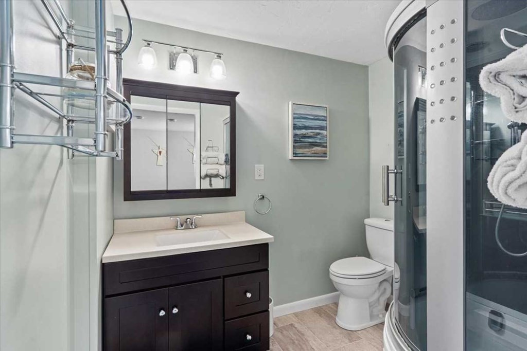 170 Shepard Road Sturbridge, MA 01566 - Photo 19 of 41 a bathroom with a toilet sink and mirror