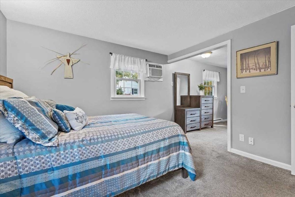 170 Shepard Road Sturbridge, MA 01566 - Photo 20 of 41 a bedroom with bed and window