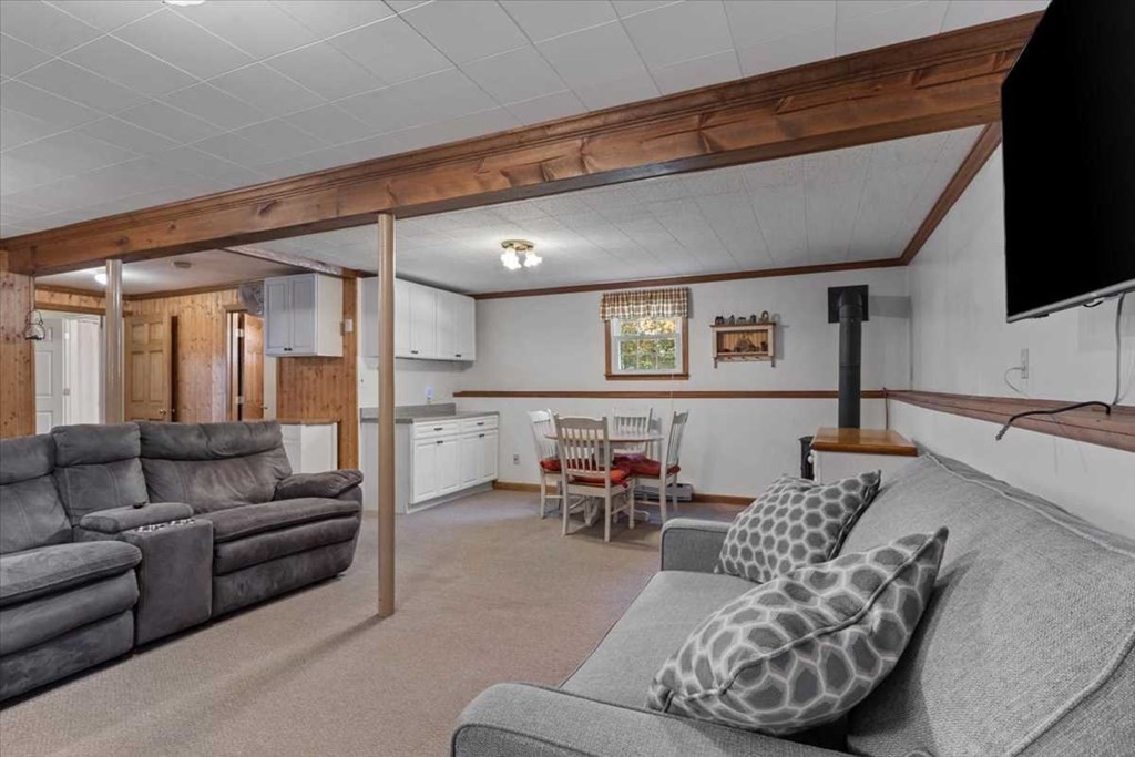 170 Shepard Road Sturbridge, MA 01566 - Photo 23 of 41 a living room with furniture and a flat screen tv