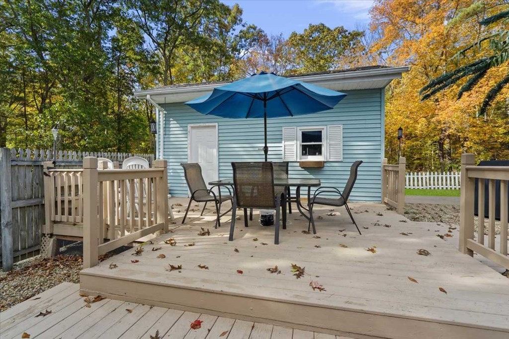 170 Shepard Road Sturbridge, MA 01566 - Photo 36 of 41 a view of a chairs and table on the wooden floor