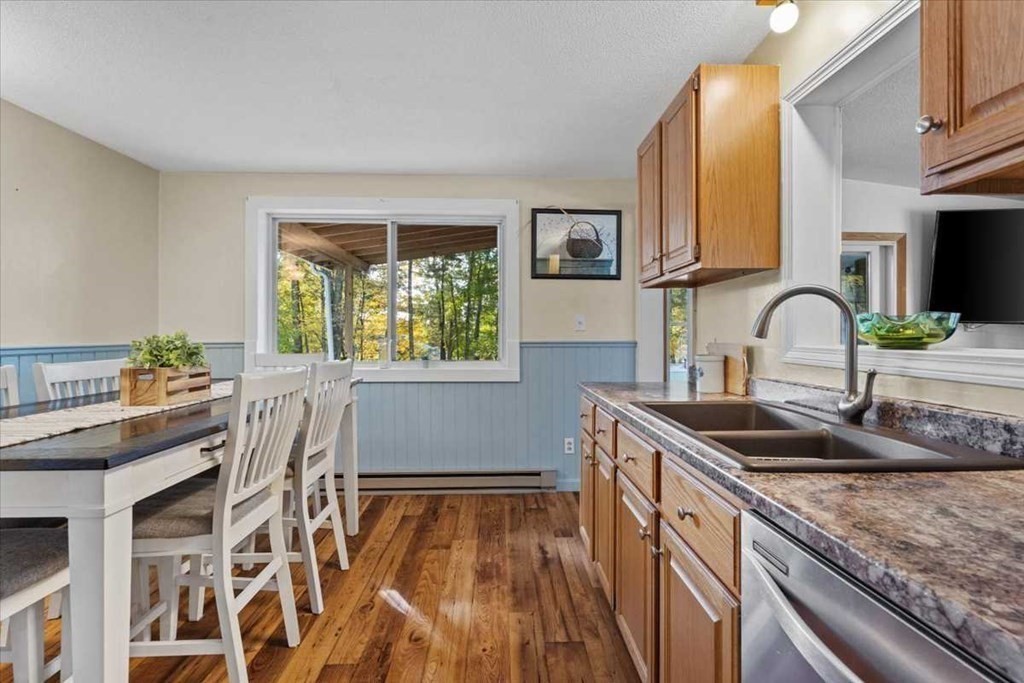 170 Shepard Road Sturbridge, MA 01566 - Photo 8 of 41 a kitchen with stainless steel appliances granite countertop a sink and a stove
