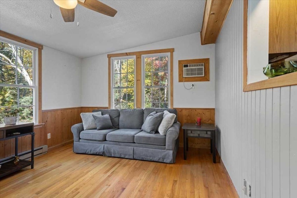 170 Shepard Road Sturbridge, MA 01566 - Photo 10 of 41 a living room with furniture and a large window
