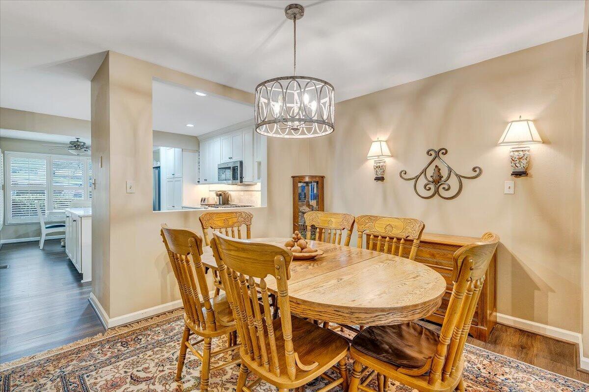 66 Scarlet Street Hardy, VA 24101 - Photo 22 of 72 a view of a dining room with furniture wooden floor and a chandelier