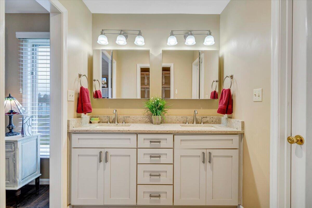 66 Scarlet Street Hardy, VA 24101 - Photo 32 of 72 a bathroom with a sink and a mirror