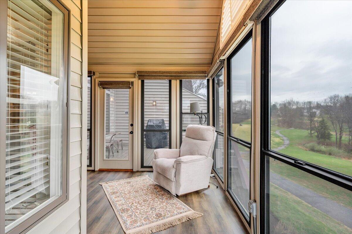 66 Scarlet Street Hardy, VA 24101 - Photo 40 of 72 a living room with furniture and a floor to ceiling window