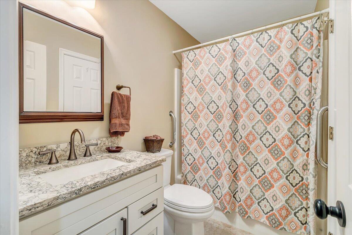 66 Scarlet Street Hardy, VA 24101 - Photo 46 of 72 a bathroom with a granite countertop sink and a mirror