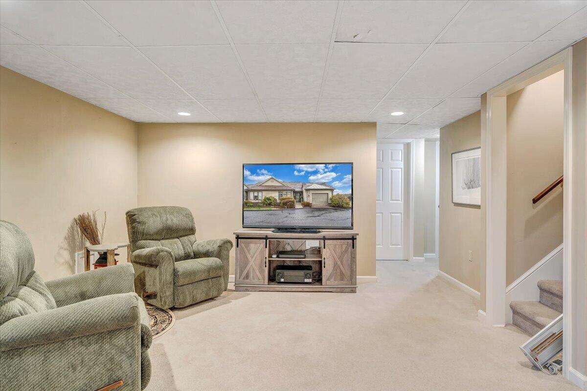 66 Scarlet Street Hardy, VA 24101 - Photo 49 of 72 a living room with furniture and a flat screen tv