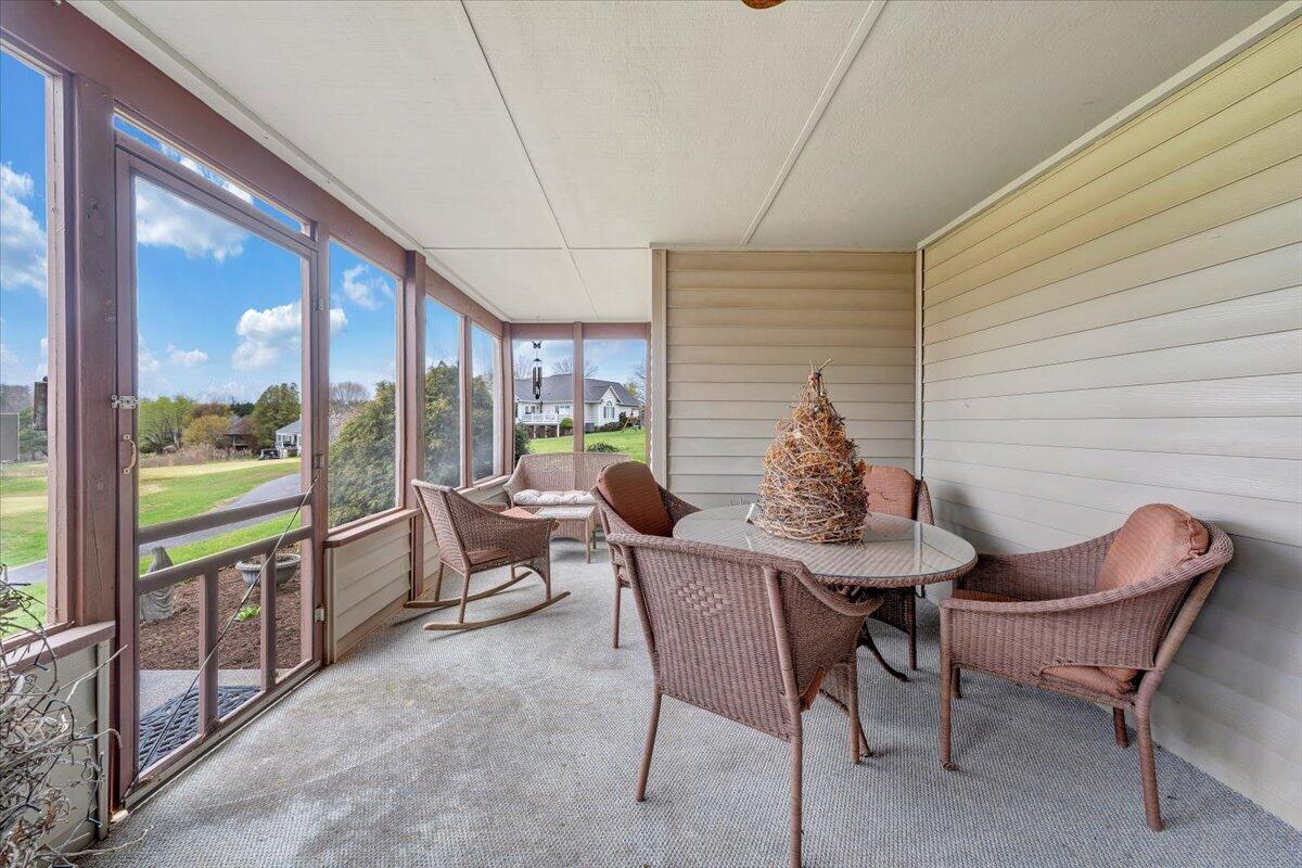 66 Scarlet Street Hardy, VA 24101 - Photo 58 of 72 a dining room with furniture and a floor to ceiling window