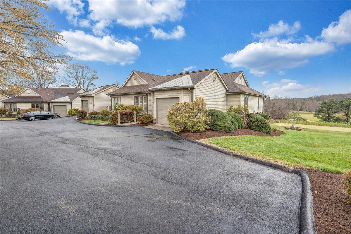 66 Scarlet Street Hardy, VA 24101 - Photo 69 of 72 a view of a house with a big yard and large trees