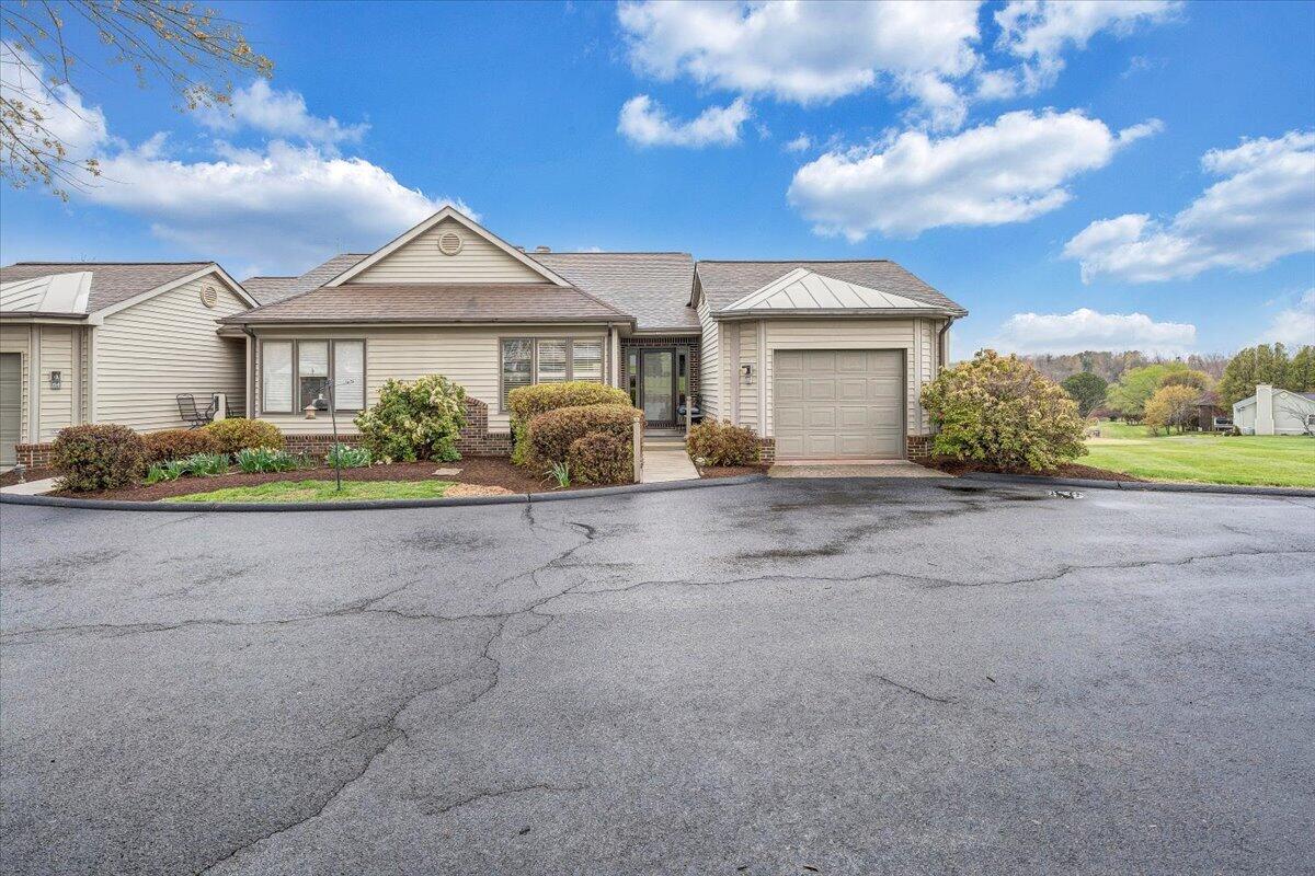 66 Scarlet Street Hardy, VA 24101 - Photo 71 of 72 a front view of a house with garden