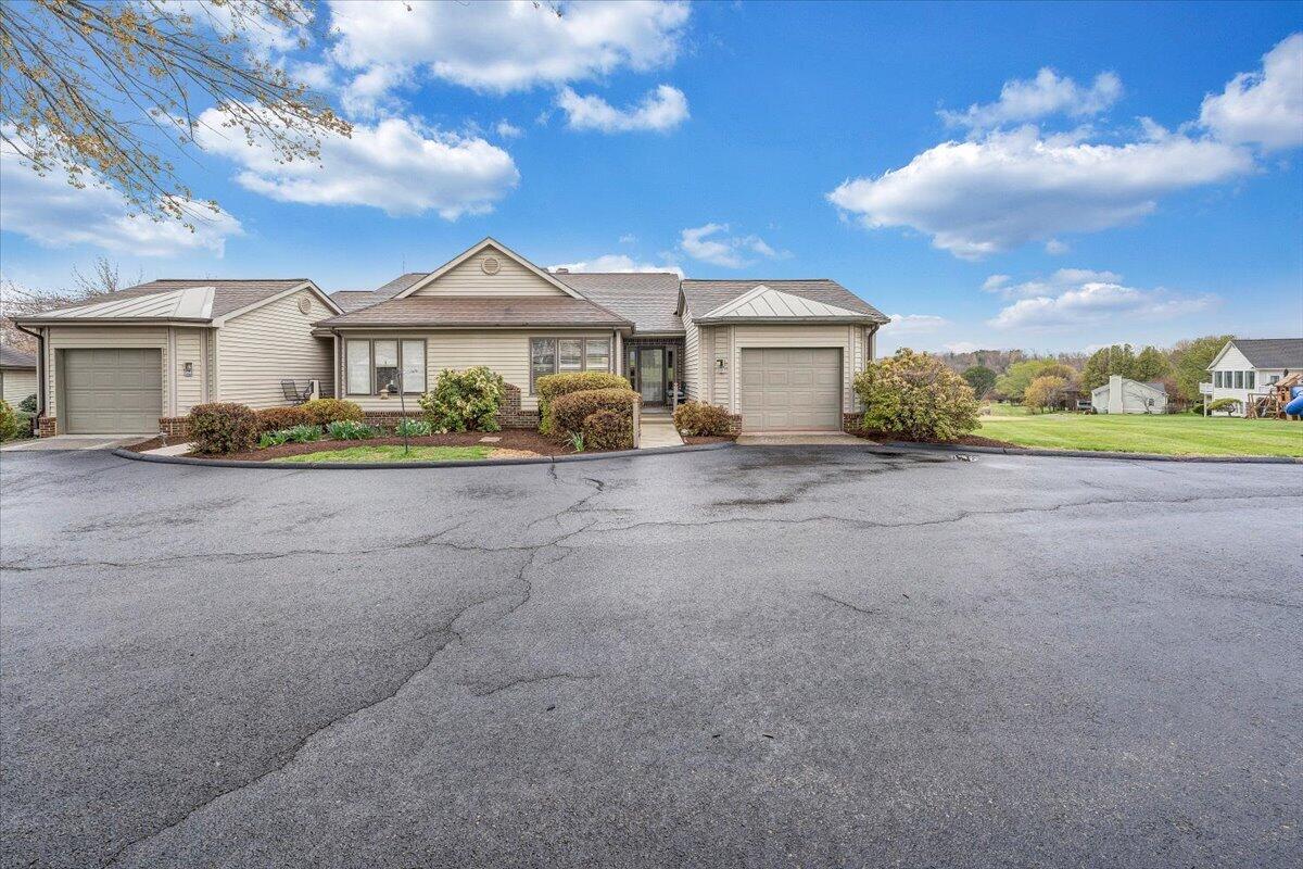 66 Scarlet Street Hardy, VA 24101 - Photo 72 of 72 a view of a house with a yard and large tree