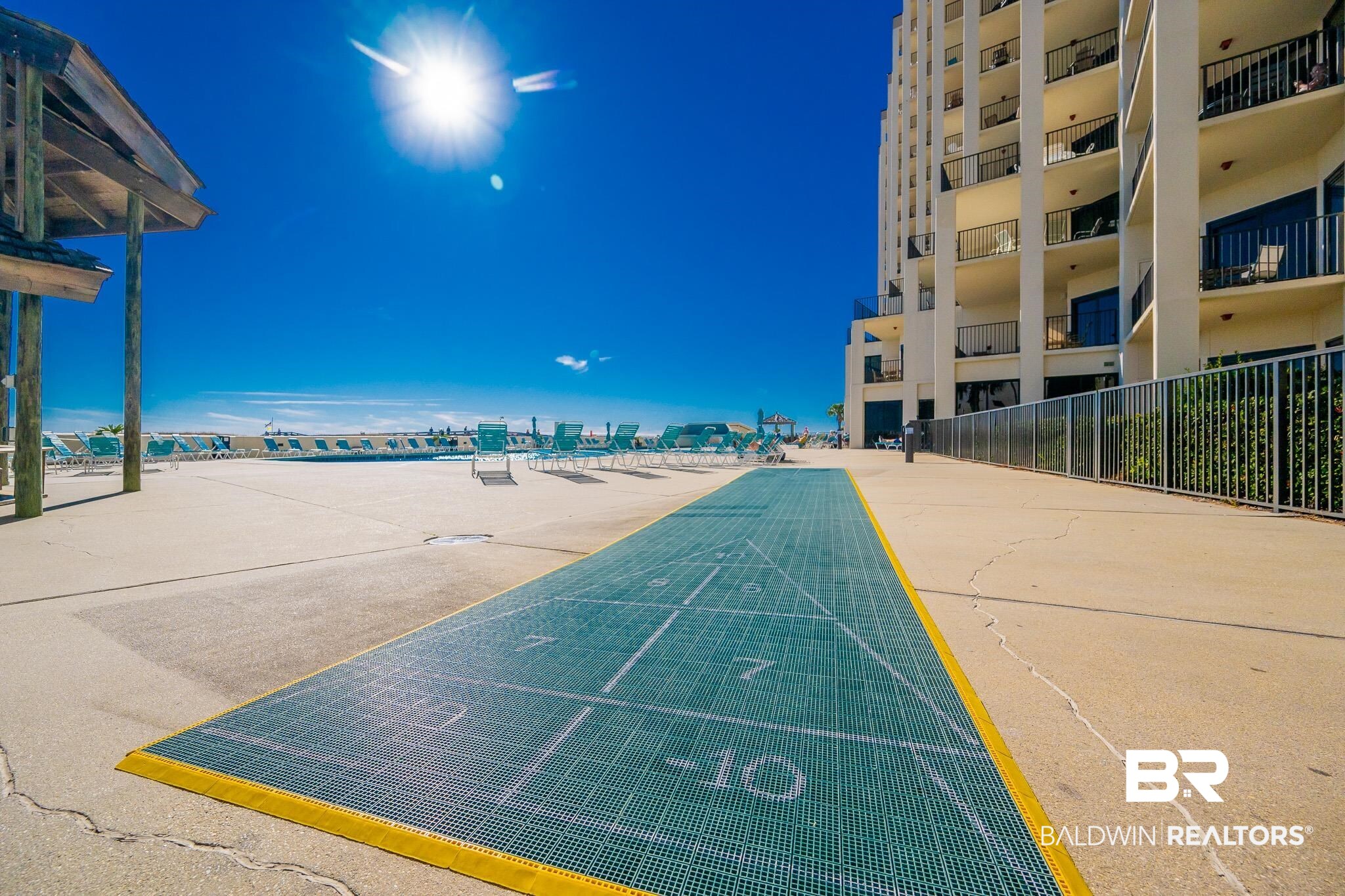 26802 Perdido Beach Boulevard, Unit 406 Orange Beach, AL 36561 - Photo 29 of 37 View of property's community featuring shuffleboard