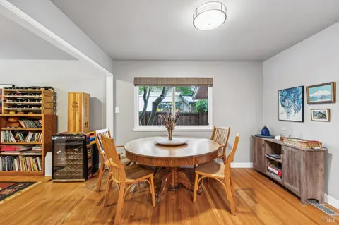 a kitchen with stainless steel appliances granite countertop wooden cabinets a stove top oven a sink and dishwasher