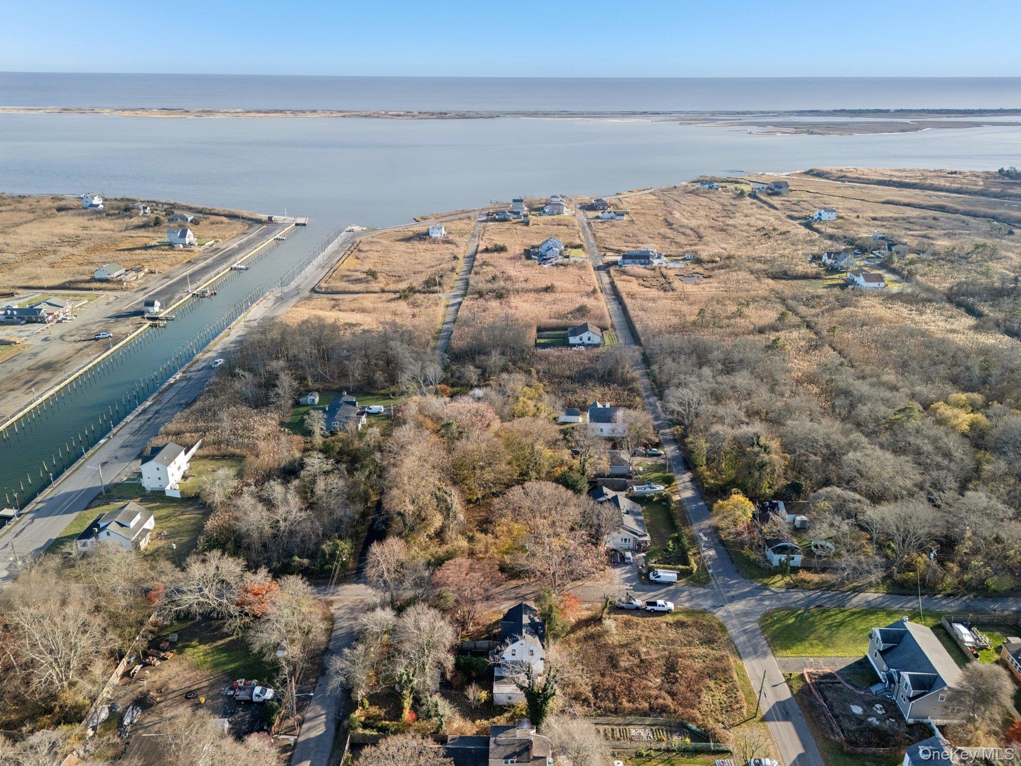 83 Elm Road East Mastic Beach, NY 11951 - Photo 25 of 34 a view of an ocean and beach