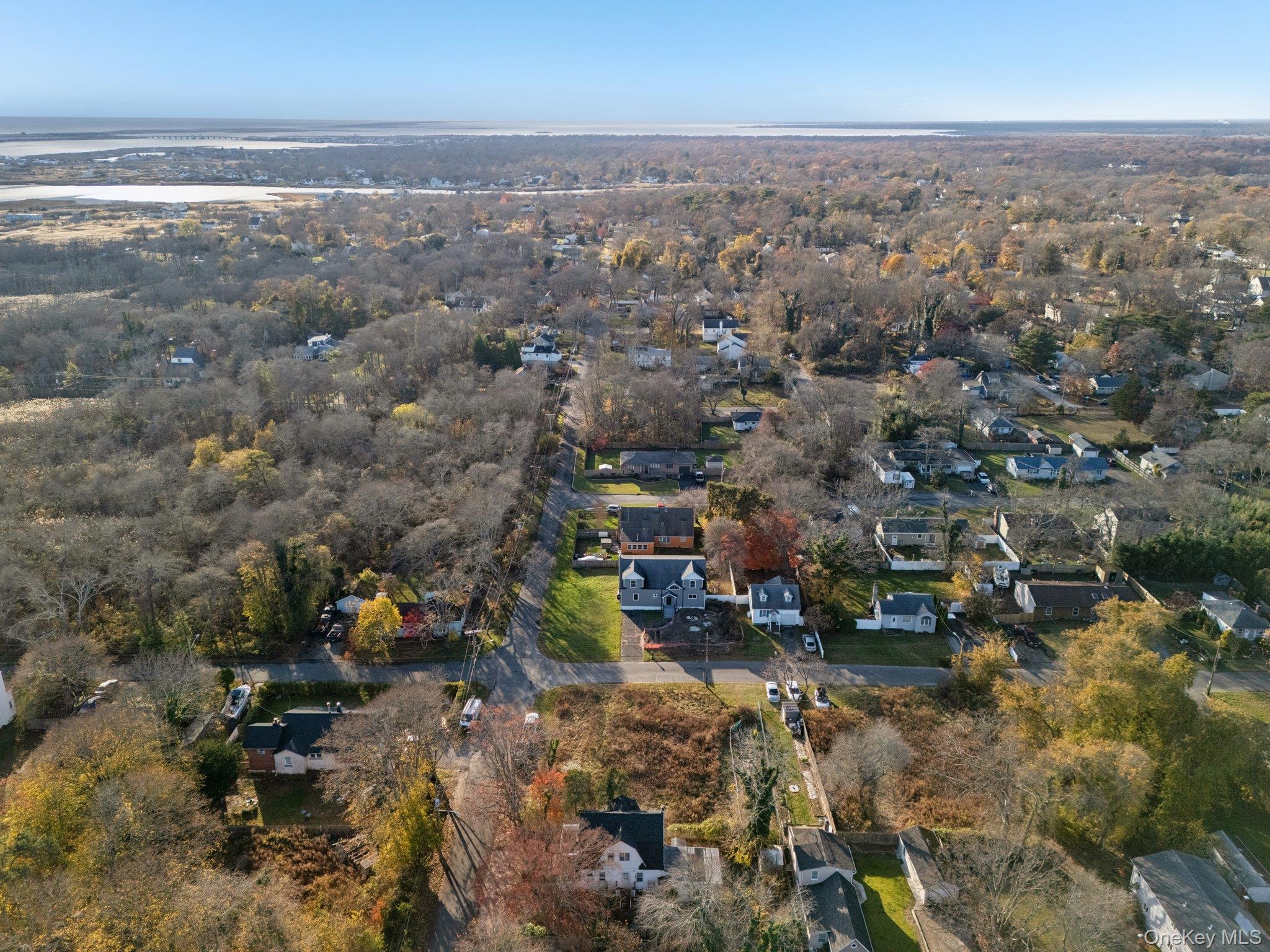 83 Elm Road East Mastic Beach, NY 11951 - Photo 28 of 34 an aerial view of multiple house