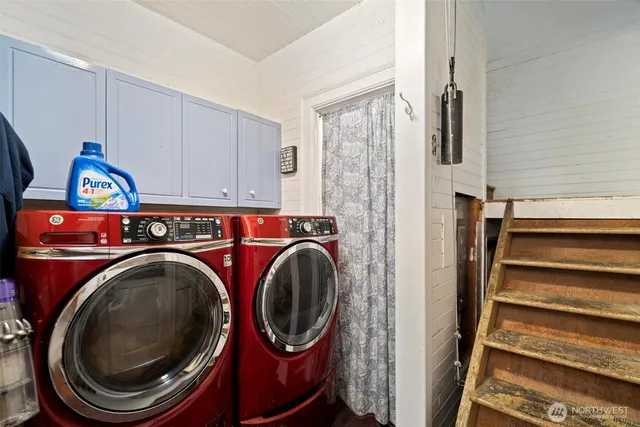 a utility room with dryer and washer