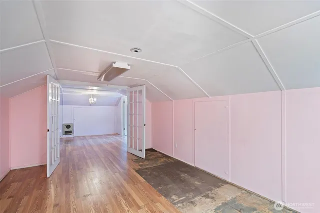 a view of entryway with wooden floor