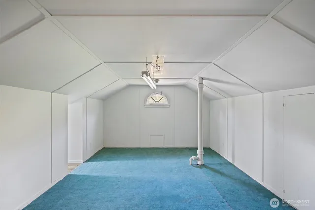 a view of a room with lots of windows