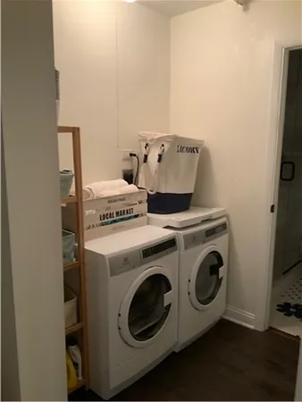 a utility room with dryer and washer