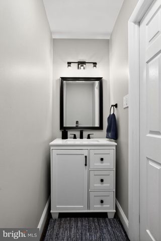 a bed room with a bed and a window