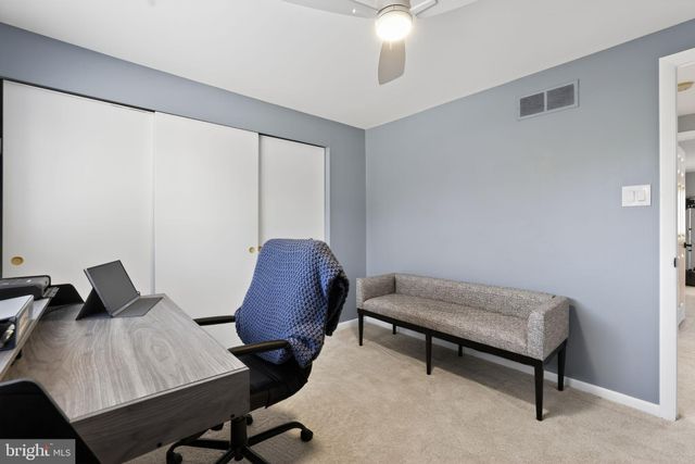 a view of a room with a wardrobe space