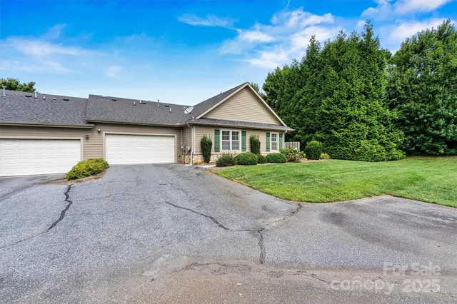 a house with yard in front of it