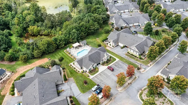 an aerial view of residential house with outdoor space
