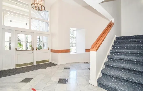 a view of an entryway with staircase