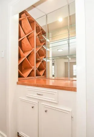 a view of a room with rack on the wall