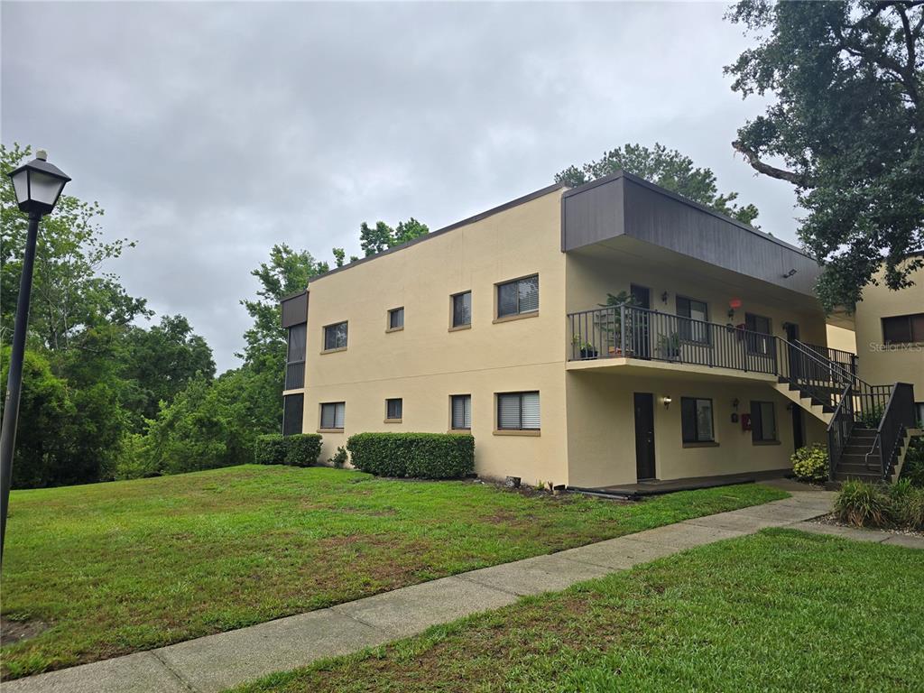 11802 Raintree Lake Lane, Unit B Temple Terrace, FL 33617 - Photo 1 of 1 a view of house with yard