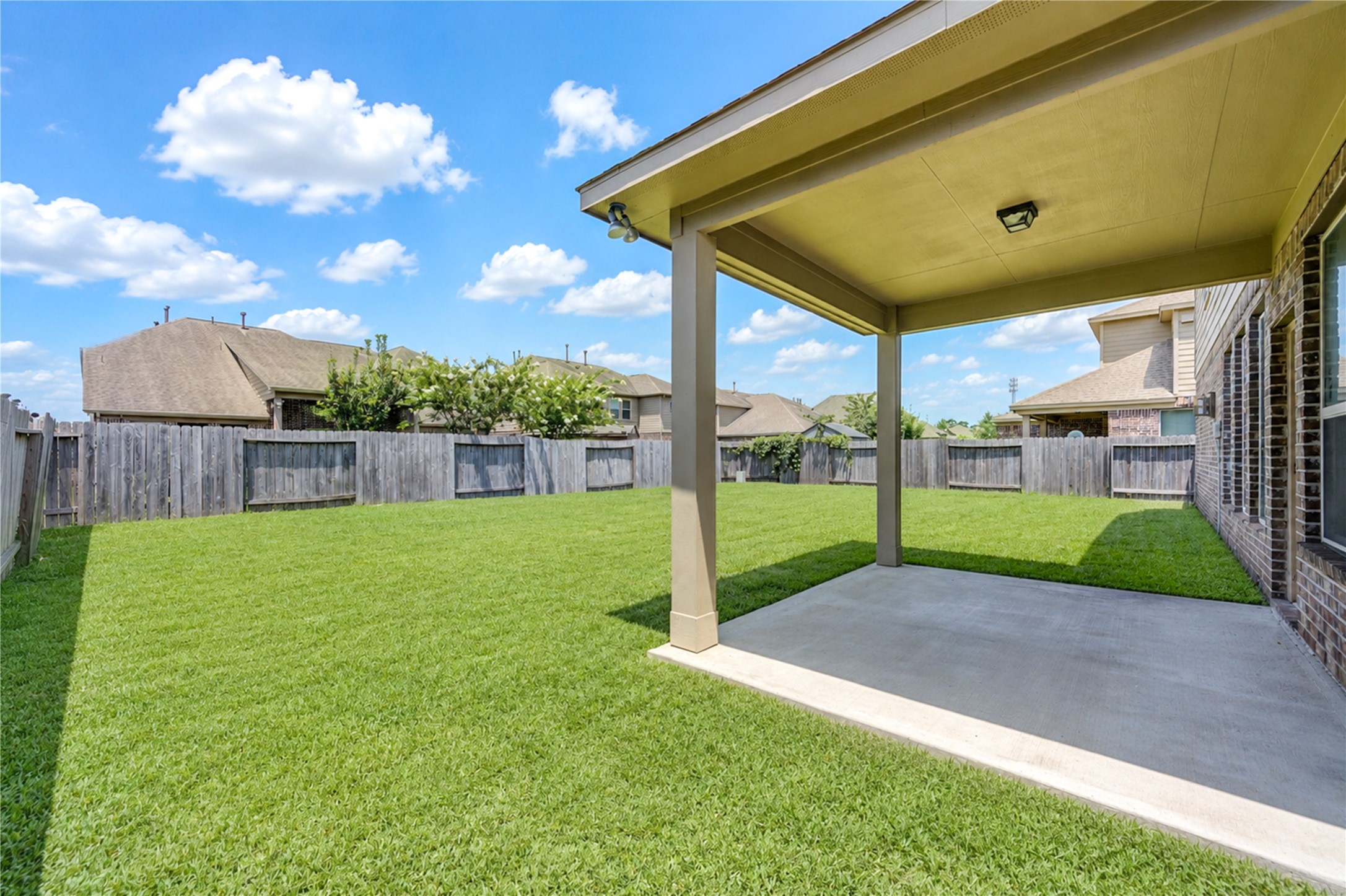24511 Stratton Creek Drive Spring, TX 77373 - Photo 24 of 27 Expansive Backyard – Enjoy a generously sized backyard with endless possibilities to create your own outdoor oasis, garden, play area, or entertaining space.