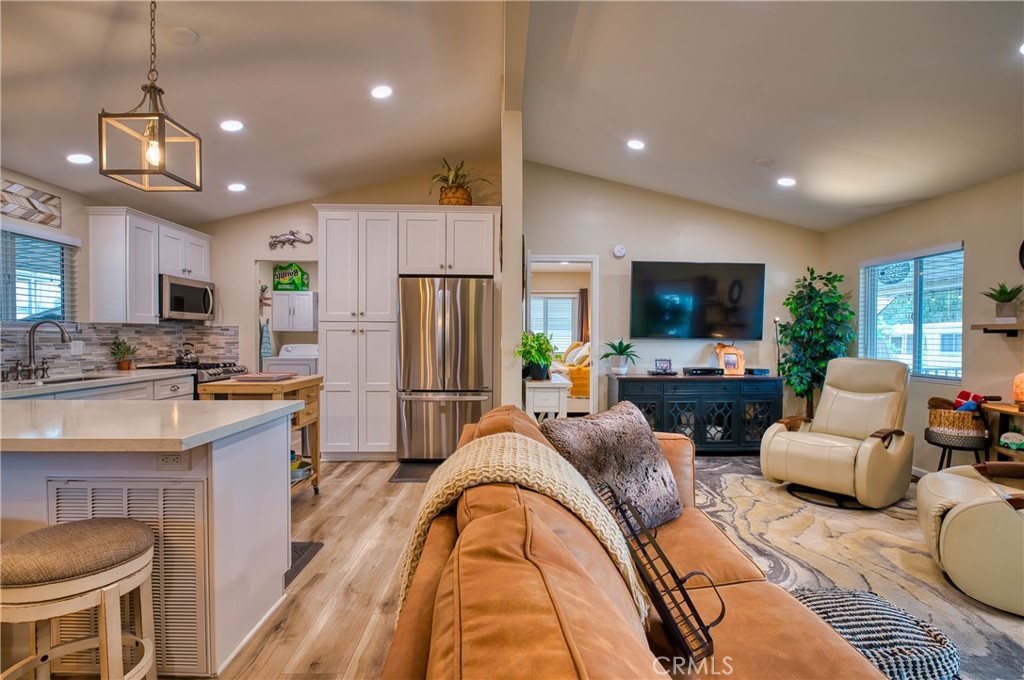2054 Parker Dam Road, Unit E8 Earp, CA 92242 - Photo 11 of 75 a living room with fireplace furniture and a flat screen tv