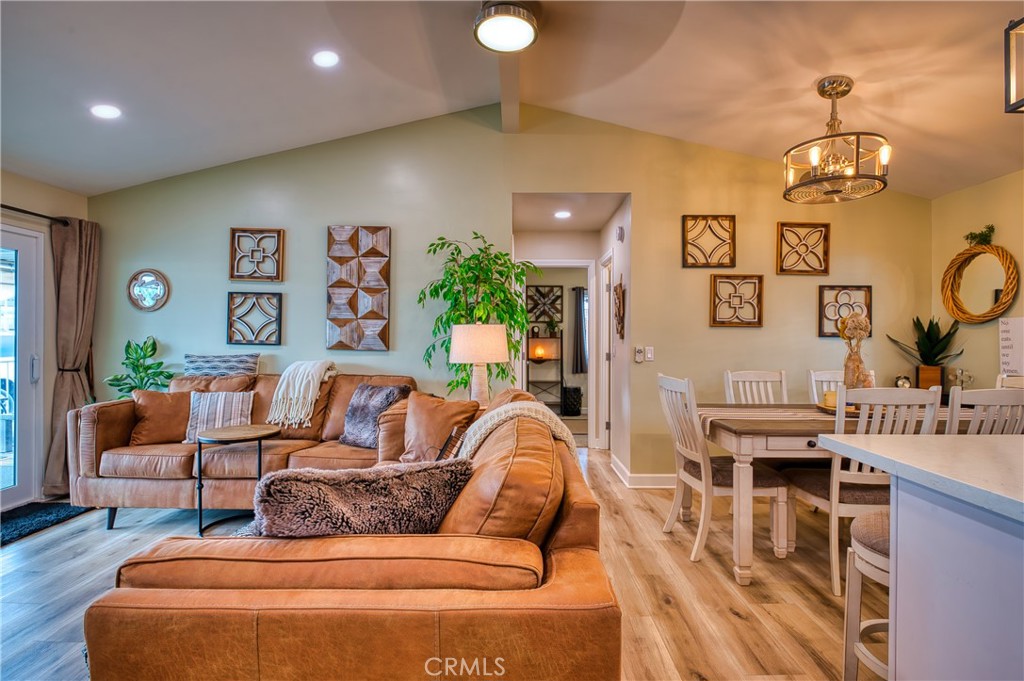 2054 Parker Dam Road, Unit E8 Earp, CA 92242 - Photo 12 of 75 a living room with furniture and a chandelier