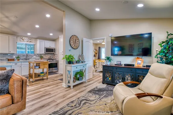 a kitchen with a stove and a microwave
