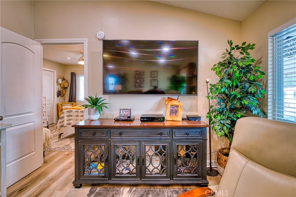 2054 Parker Dam Road, Unit E8 Earp, CA 92242 - Photo 15 of 75 a living room with furniture and a potted plant