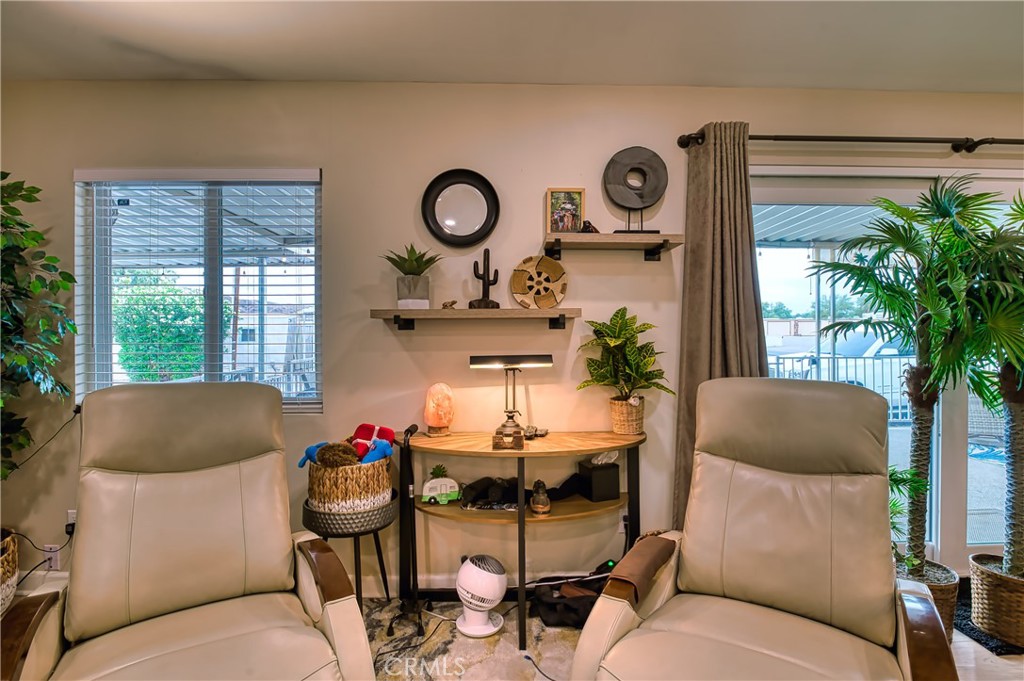 2054 Parker Dam Road, Unit E8 Earp, CA 92242 - Photo 16 of 75 a living room with furniture and a large window