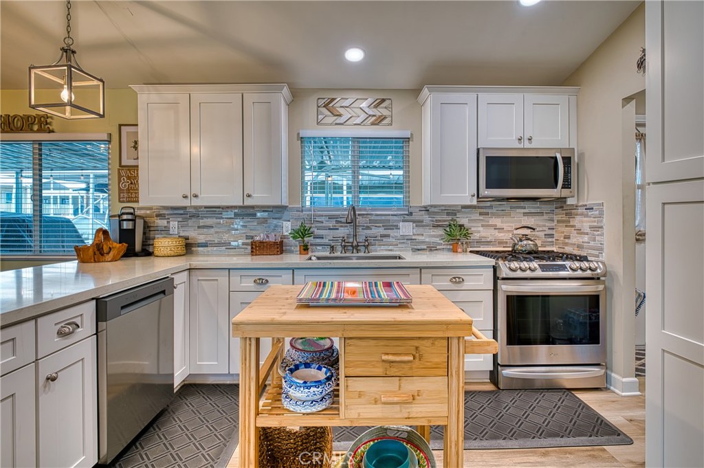 2054 Parker Dam Road, Unit E8 Earp, CA 92242 - Photo 18 of 75 a kitchen with a stove and a microwave