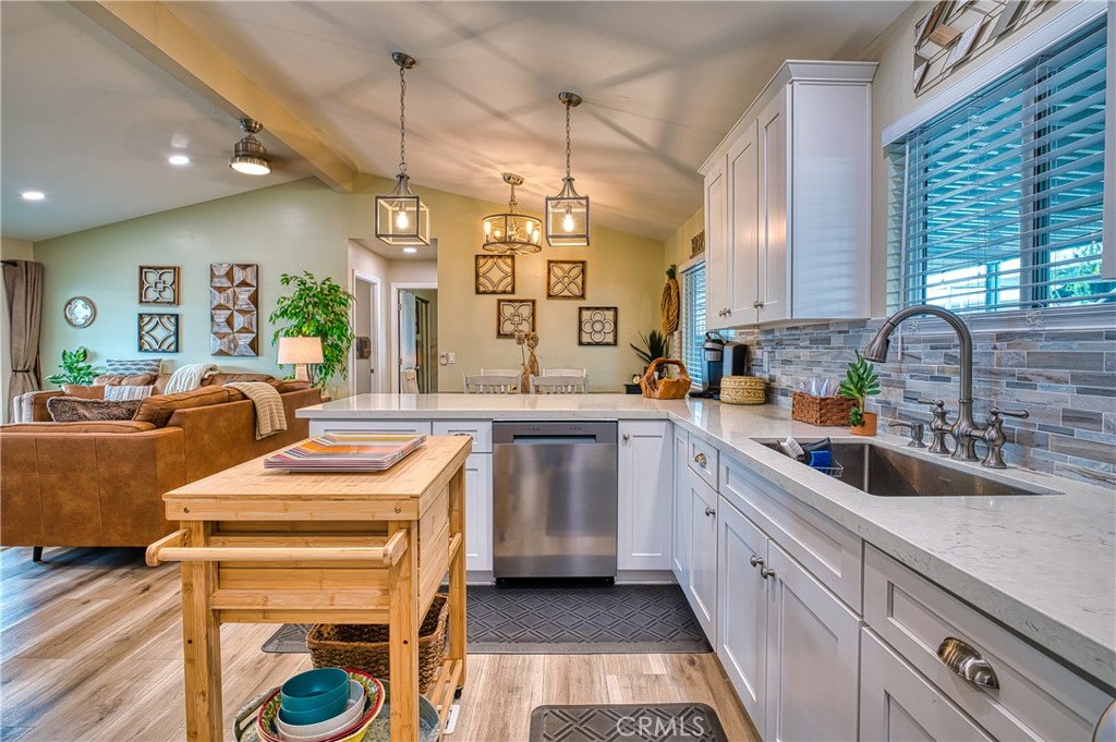 2054 Parker Dam Road, Unit E8 Earp, CA 92242 - Photo 20 of 75 a kitchen with stainless steel appliances sink stove and cabinets