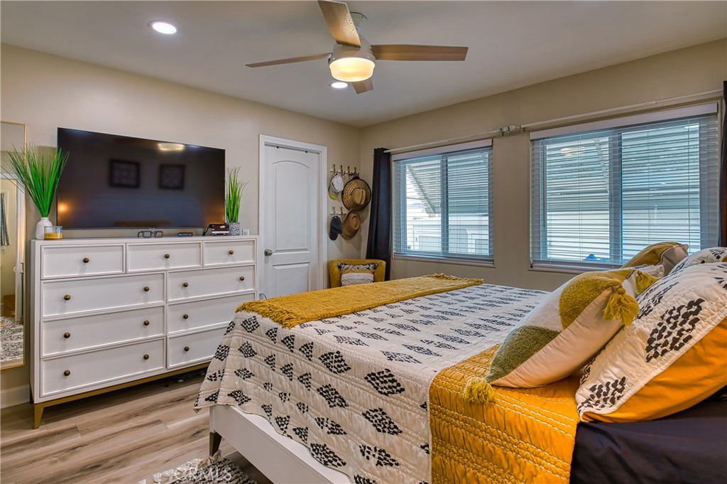 2054 Parker Dam Road, Unit E8 Earp, CA 92242 - Photo 35 of 75 a bedroom with a bed and a flat screen television