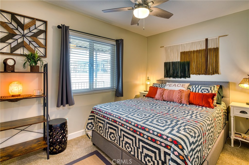 2054 Parker Dam Road, Unit E8 Earp, CA 92242 - Photo 45 of 75 a bedroom with a bed and flat screen tv