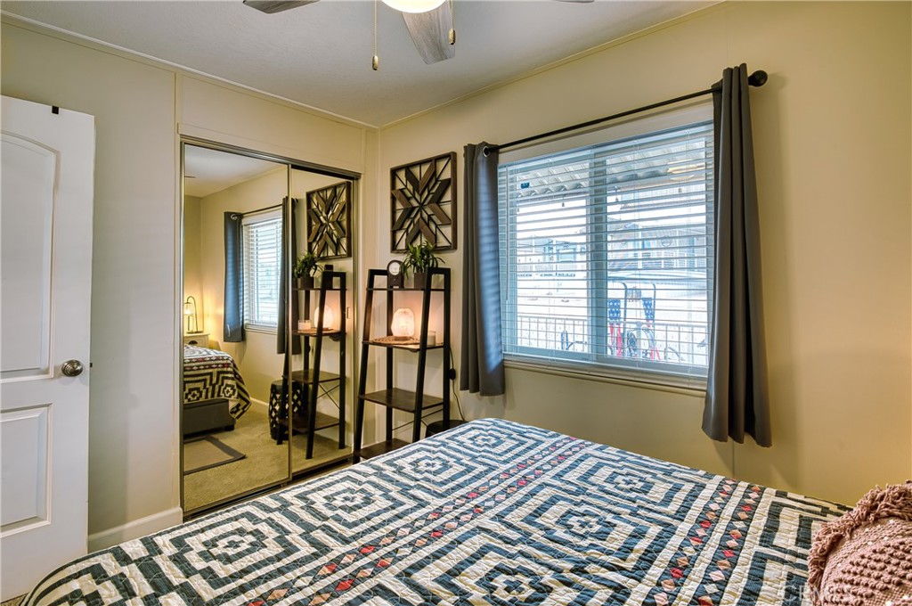 2054 Parker Dam Road, Unit E8 Earp, CA 92242 - Photo 48 of 75 a bedroom with a bed and a window