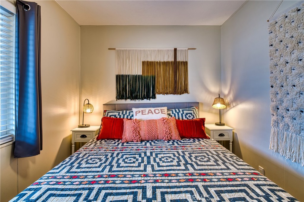 2054 Parker Dam Road, Unit E8 Earp, CA 92242 - Photo 49 of 75 a living room with furniture and a flat screen tv