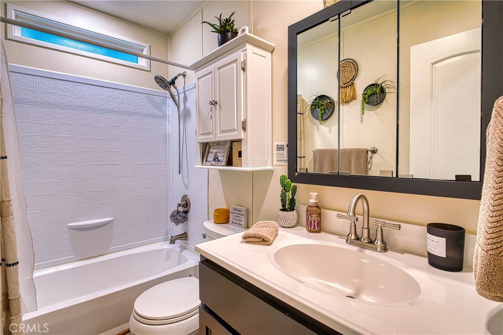 2054 Parker Dam Road, Unit E8 Earp, CA 92242 - Photo 50 of 75 a bathroom with a granite countertop sink a toilet and shower