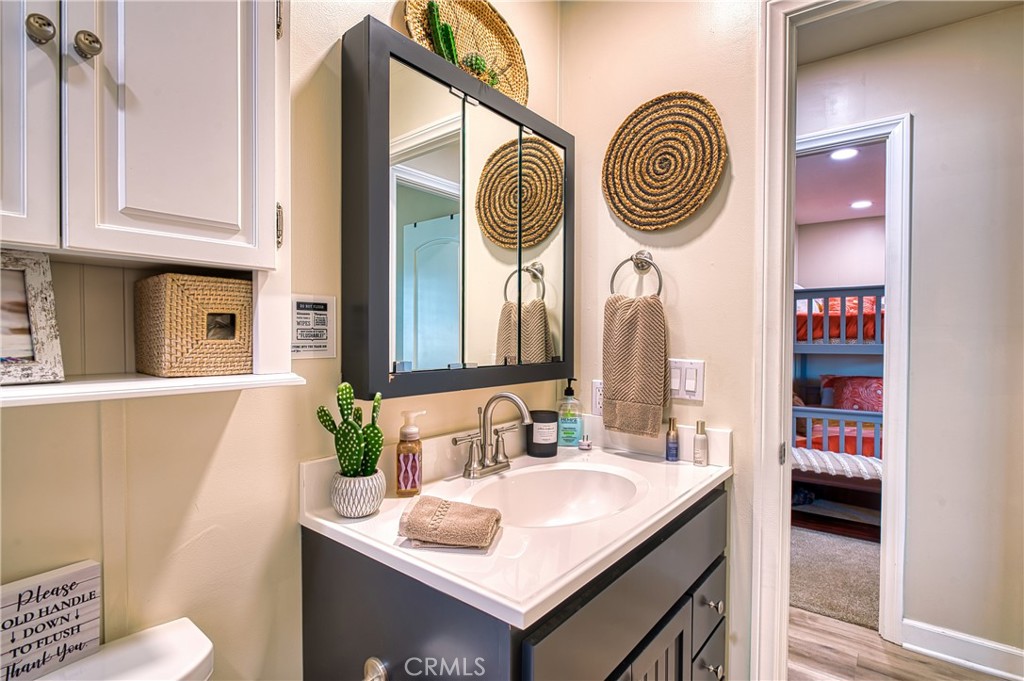 2054 Parker Dam Road, Unit E8 Earp, CA 92242 - Photo 52 of 75 a bathroom with a sink and a mirror