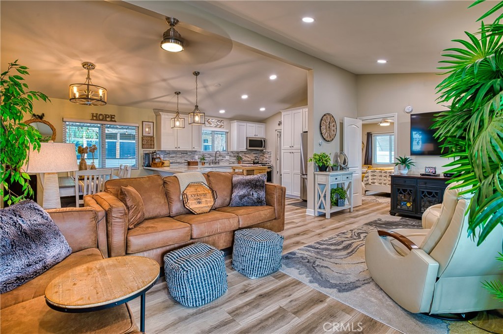 2054 Parker Dam Road, Unit E8 Earp, CA 92242 - Photo 7 of 75 a living room with furniture kitchen view and a potted plant