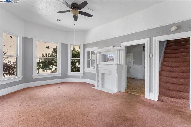 a view of a room with a large window