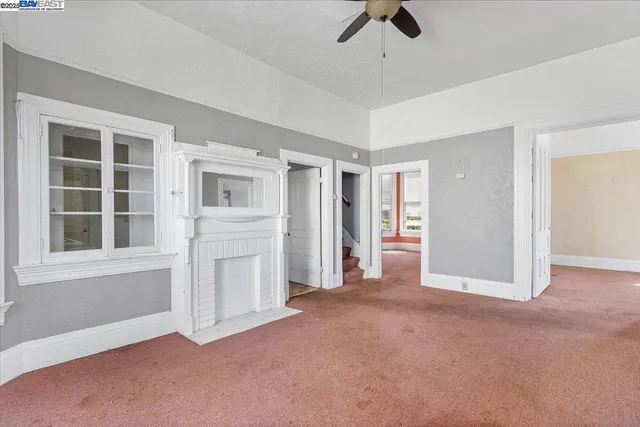 an empty room with windows